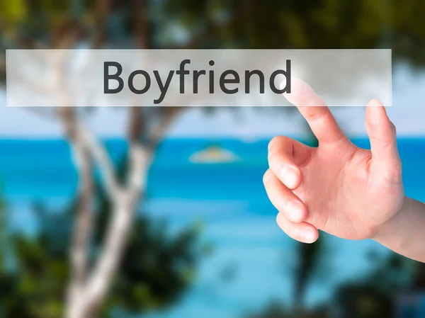 Boyfriend - Hand pressing a button on blurred background concept — Stock Photo, Image