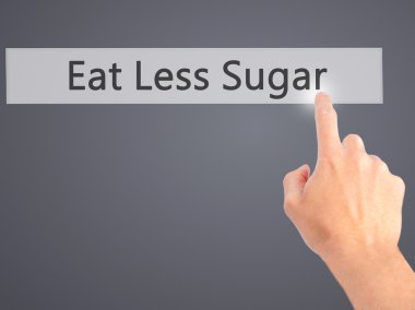 Daha az şeker - arka plan bulanık co üzerinde bir düğmeye basarak el yemek