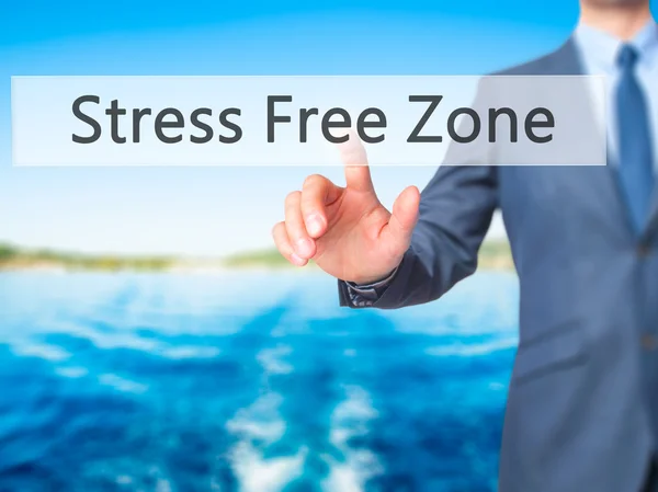 Stress Free Zone - Businessman hand pressing button on touch scr — Stock Photo, Image