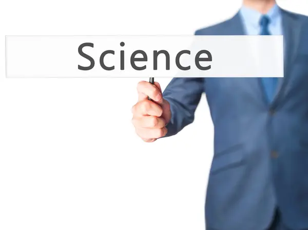 Science-affärsman hand innehav Sign — Stockfoto