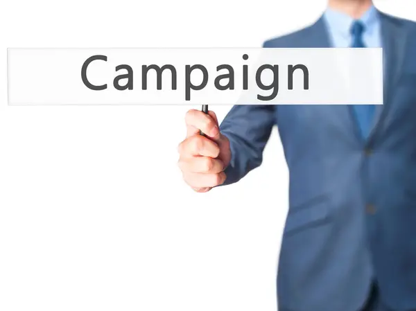 Campaña - Empresario mano sosteniendo cartel — Foto de Stock