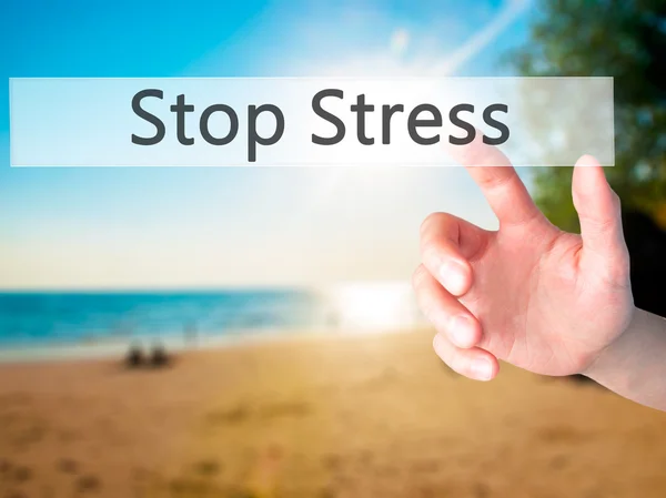 Stop stressz - kéz egy gomb lenyomásával elmosódott háttér conce — Stock Fotó