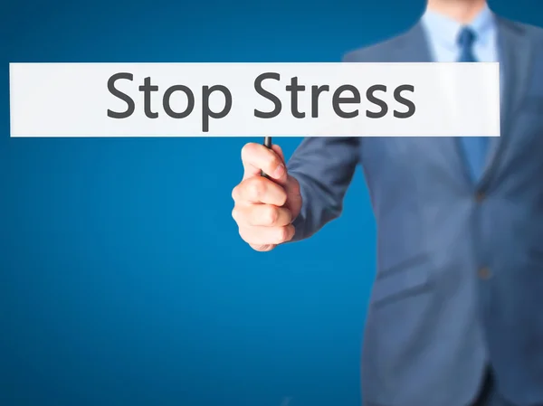 Stop stressz - üzletember kezében jele — Stock Fotó