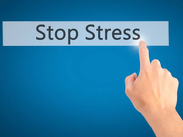 Stop Stress - Mano presionando un botón sobre el cono de fondo borroso —  Fotos de Stock