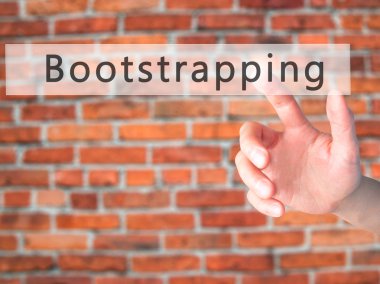 Bootstrapping - Hand pressing a button on blurred background con clipart