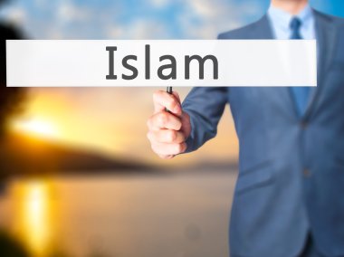 Islam - işadamı el işareti tutarak