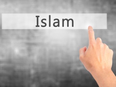 Islam - arka plan bulanık kavramı üzerinde bir düğmeye basarak el 