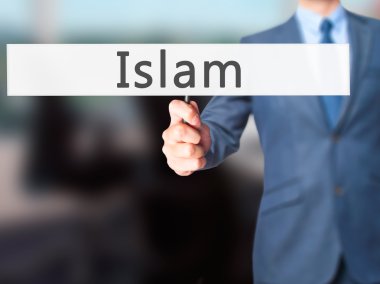 Islam - işadamı el işareti tutarak