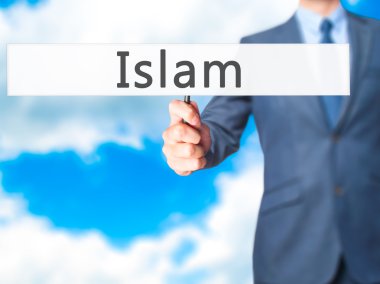 Islam - işadamı el işareti tutarak