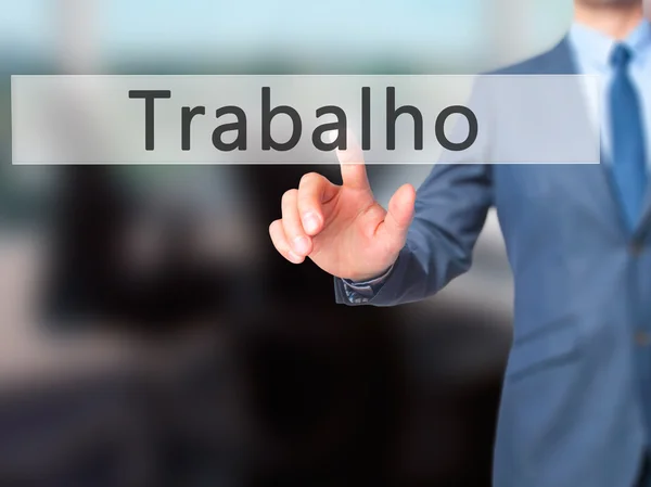Trabalho (praca w języku portugalskim) - biznesmen ręcznie naciskając przycisk — Zdjęcie stockowe