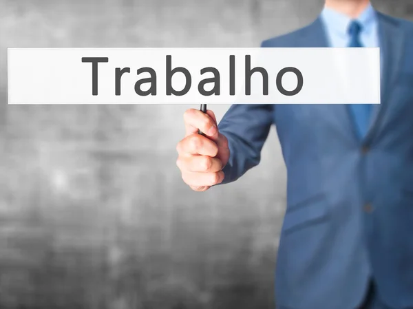Trabalho (Travail en portugais) - Panneau de maintien de la main d'un homme d'affaires — Photo