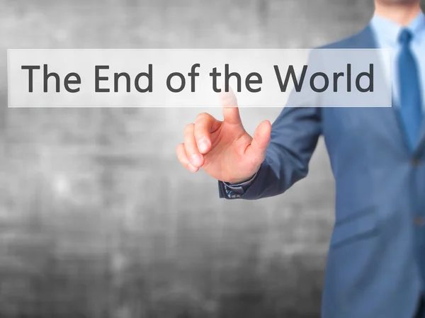Het einde van de wereld - zakenman hand dringende knop op touch — Stockfoto