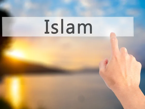 Islam - Mão pressionando um botão no conceito de fundo borrado em — Fotografia de Stock