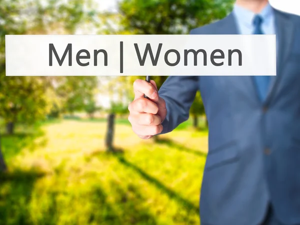 Männer Frauen - Geschäftsmann Hand hält Zeichen — Stockfoto