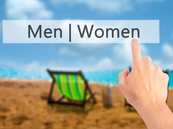 Män kvinnor - Hand trycka på en knapp på suddig bakgrund koncept — Stockfoto