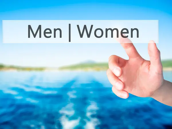 Men Women - Hand pressing a button on blurred background concept — Stock Photo, Image