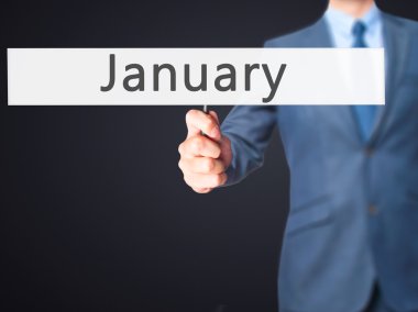 İş yaratma - dokunmatik ekran butonuna işadamı el basarak