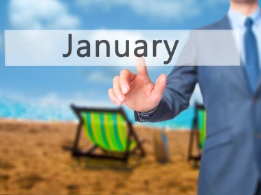 İş yaratma - dokunmatik ekran butonuna işadamı el basarak 