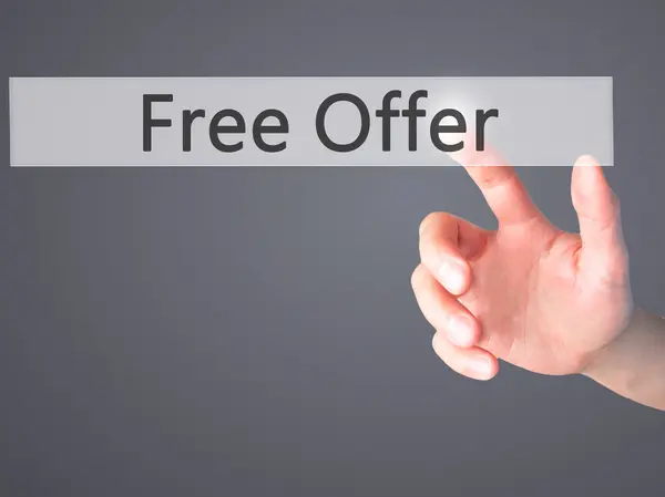 Free Offer - Businessman hand pressing button on touch screen in — Stock Photo, Image