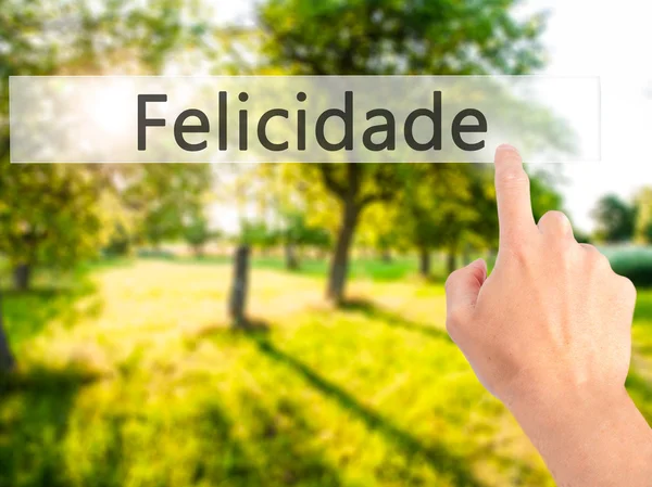 Felicidade (Felicidad en Portugués) - Mano presionando un botón en — Foto de Stock