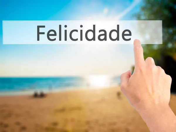 Felicidade (štěstí v portugalštině) - ručně stisknutím tlačítka na — Stock fotografie