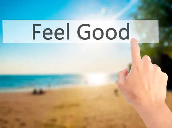 Feel Good - Bulanık arka plan konseptinde düğmeye basarak el ele — Stok fotoğraf