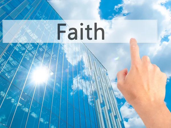 Faith - Hand pressing a button on blurred background concept on — Stock Photo, Image