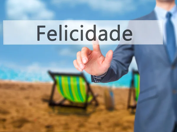 Felicidade (щастя на португальській мові) - бізнесмен рука пресування — стокове фото