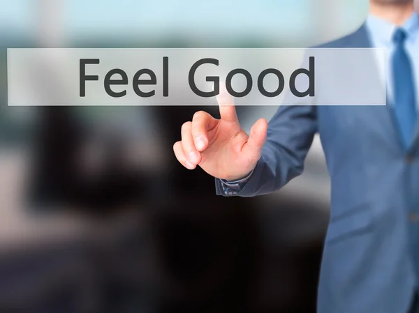 Feel good - dokunmatik ekran int işadamı el basarak düğmesini — Stok fotoğraf