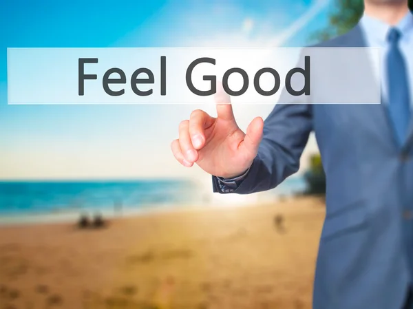 Feel Good - zakenman hand dringende knop op touch scherm int — Stockfoto