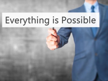 Her şey mümkündür - işadamı el işareti tutarak