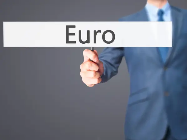 Euro - Empresario mano sosteniendo cartel — Foto de Stock