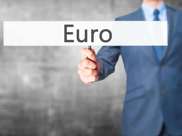 Ευρώ - επιχειρηματίας χέρι κρατάει πινακίδα — Φωτογραφία Αρχείου