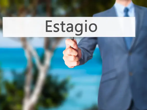 Estagio (praktik på portugisiska) - affärsman handen håller si — Stockfoto