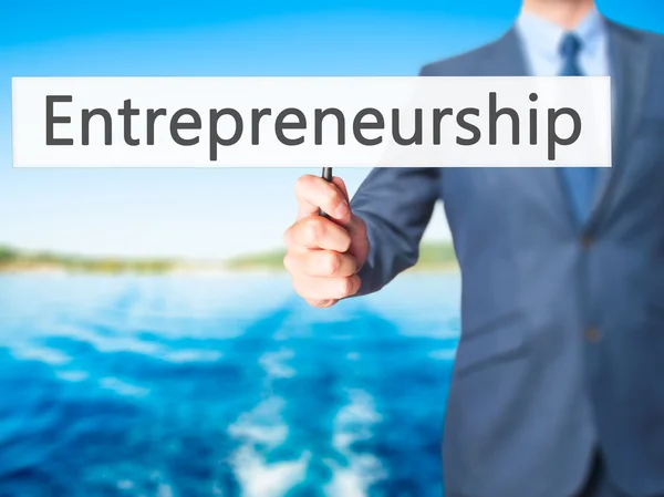 Entrepreneurship - Businessman hand holding sign — Stock Photo, Image