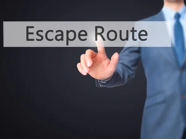 Ruta de escape - Empresario botón de mano en la pantalla táctil —  Fotos de Stock