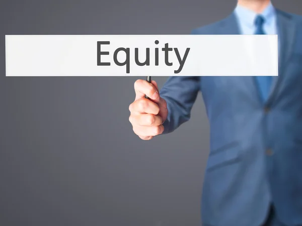 Equity - biznesmen ręka trzyma znak — Zdjęcie stockowe