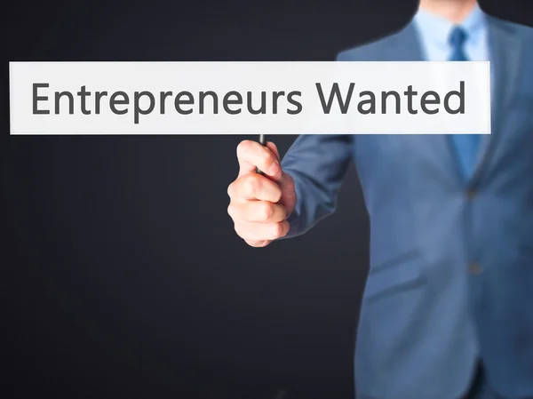 Wanted επιχειρηματίες - επιχειρηματίας χέρι κρατάει πινακίδα — Φωτογραφία Αρχείου