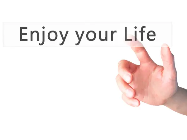 Enjoy your Life - Hand pressing a button on blurred background c — Stock Photo, Image