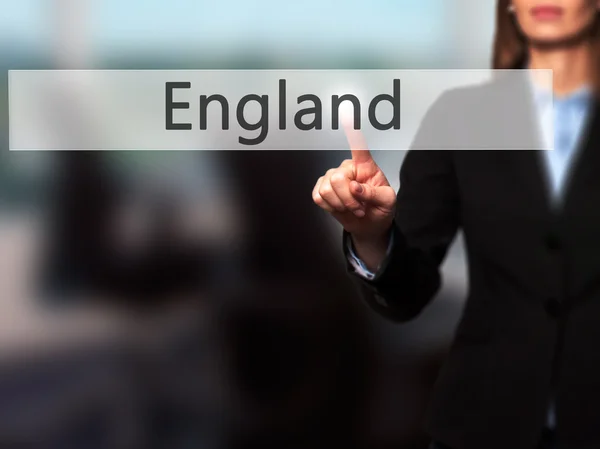 Inglaterra - Empresaria pulsando el botón de mano en la pantalla táctil int — Foto de Stock