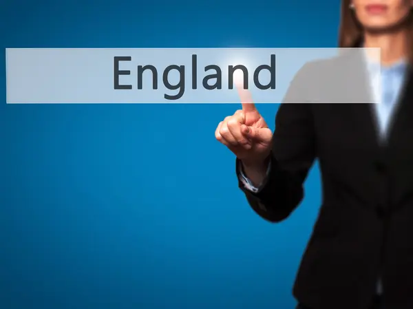 Англія - бізнес-леді рука натискаючи кнопку на сенсорний екран int — стокове фото