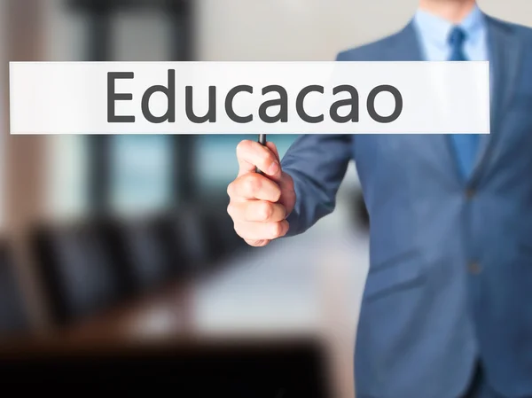 Enseignement (Educacao en portugais) - Homme d'affaires tenant la main si — Photo