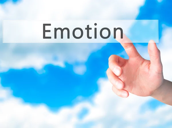 Emotion - Hand indrukken van een knop op de onscherpe achtergrond concept o — Stockfoto