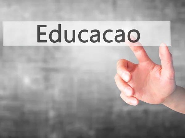 Education (Educacao in Portuguese) - Hand pressing a button on b — Stock Photo, Image