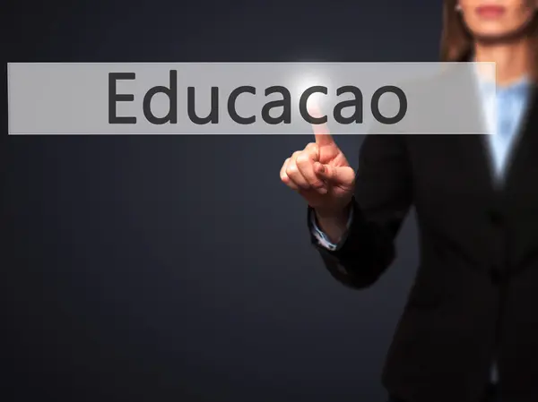 Education (Educacao in Portuguese) - Businesswoman hand pressing — Stock Photo, Image