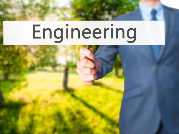 エンジニアリング - ビジネスマンハンドホールディングサイン — ストック写真