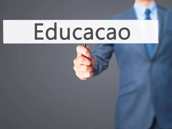 Enseignement (Educacao en portugais) - Homme d'affaires tenant la main si — Photo