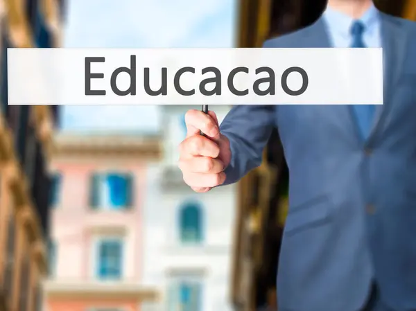 Educaco (Educação em Português) - Homem de negócios sig mão segurando — Fotografia de Stock