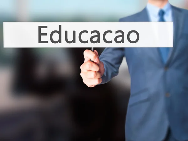 Educaco (Educación en Portugués) - Empresario de la mano sig —  Fotos de Stock