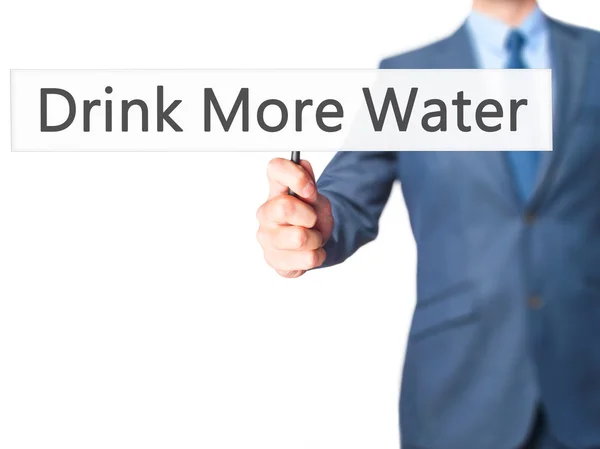 Drink More Water - Tangan pebisnis memegang tanda — Stok Foto